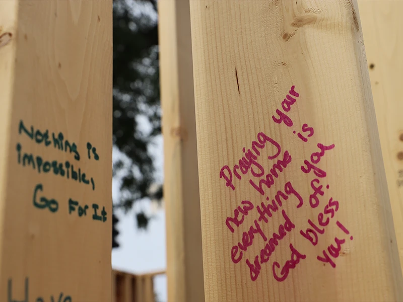 Wooden beams with messages.