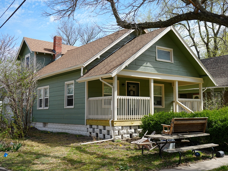 A house with its brand-new and completed siding.