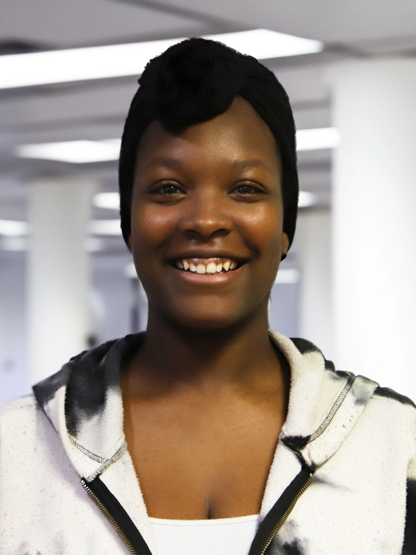 Family partner Kiara smiling for a photo.