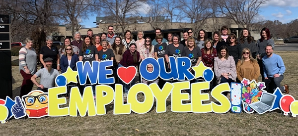 A team of Profit Builder employees together.