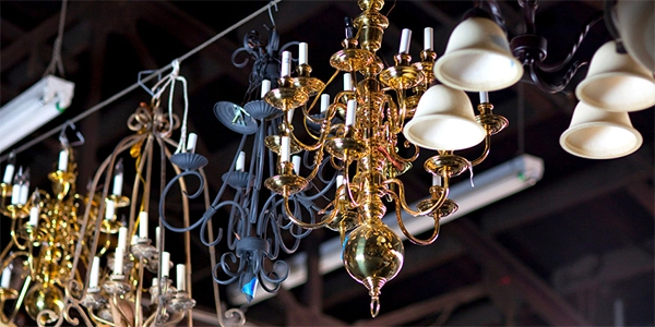 A ceiling of lighting fixtures on sale.