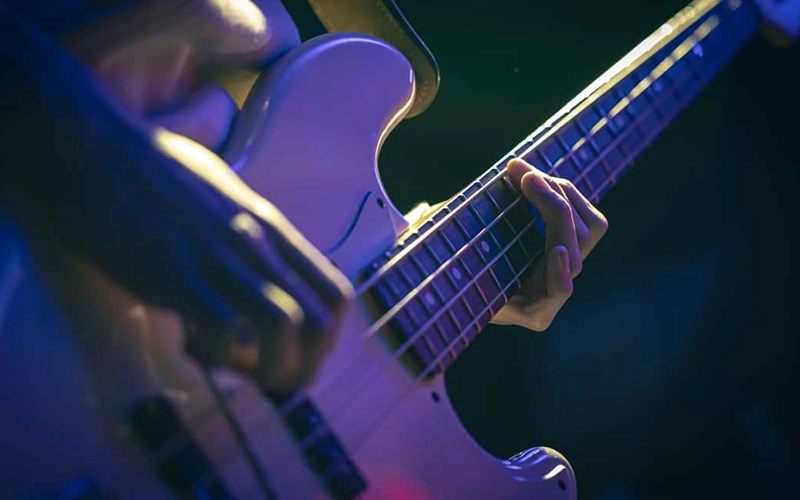 A person playing the guitar.